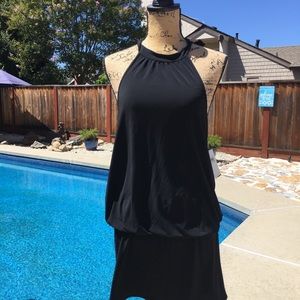 Black halter dress that’s backless.
